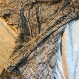 Snake print peplum scrub top